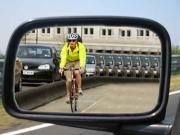 Cyclist in side mirror